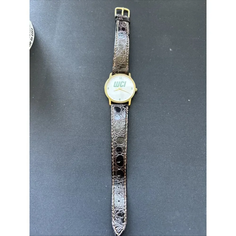 WCI Gold Tone White Dial Women’s Quartz Watch
